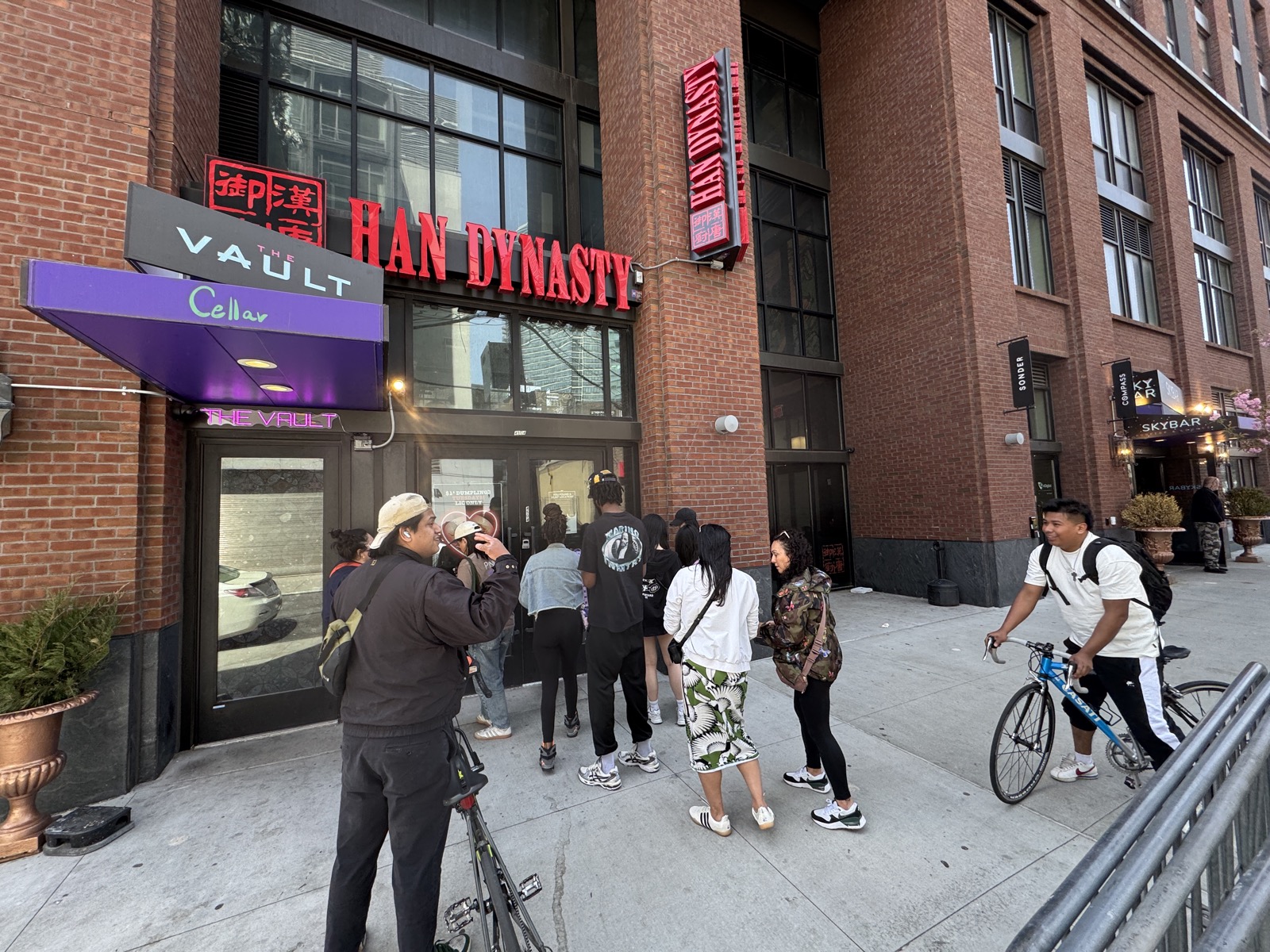 Participants gathered outside The Vault checkpoint in LIC